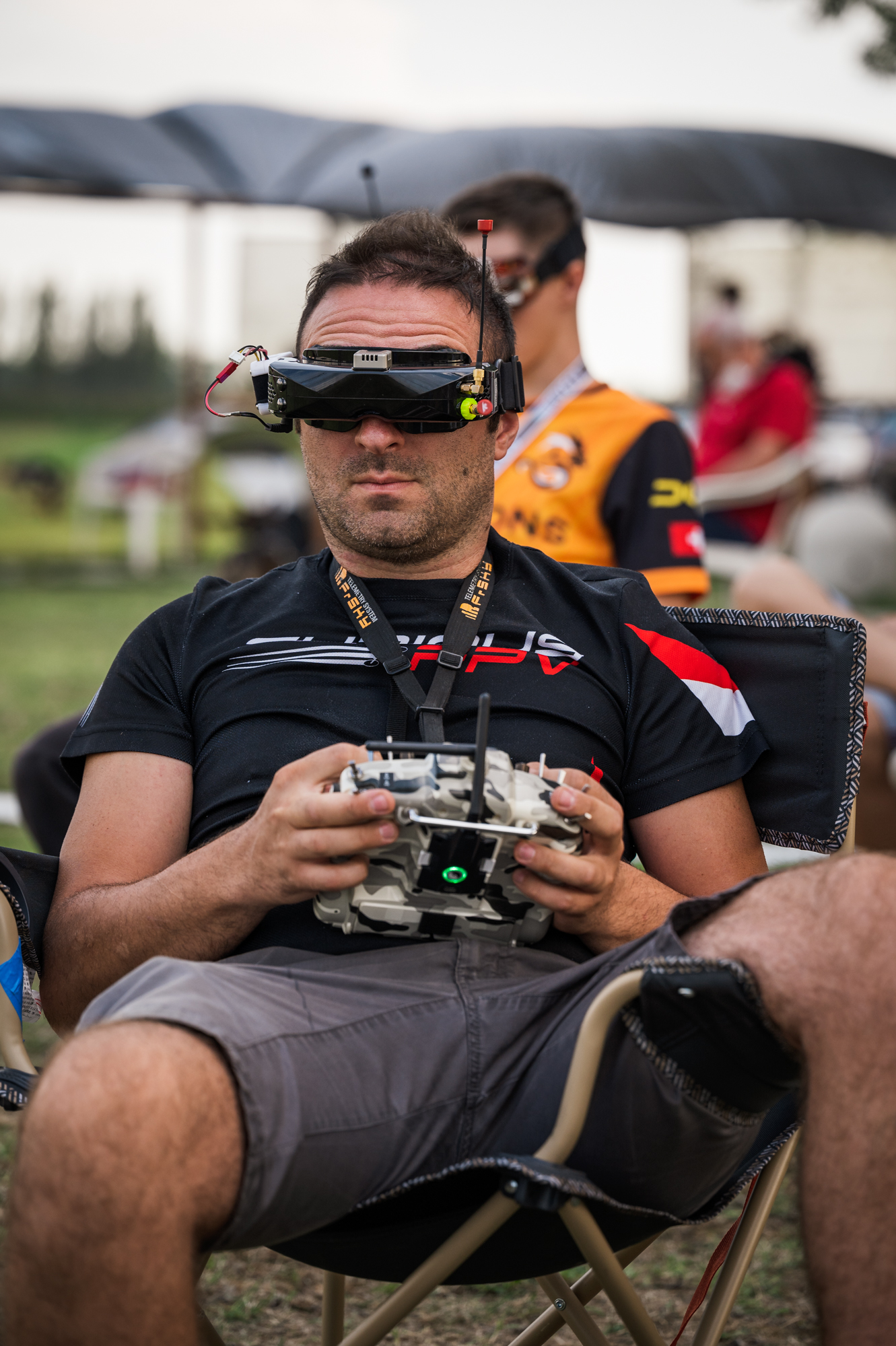 FPV pilot with goggles and controller